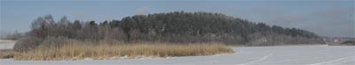 panoramabilde mot Tallberget, tatt fra midten av vannet